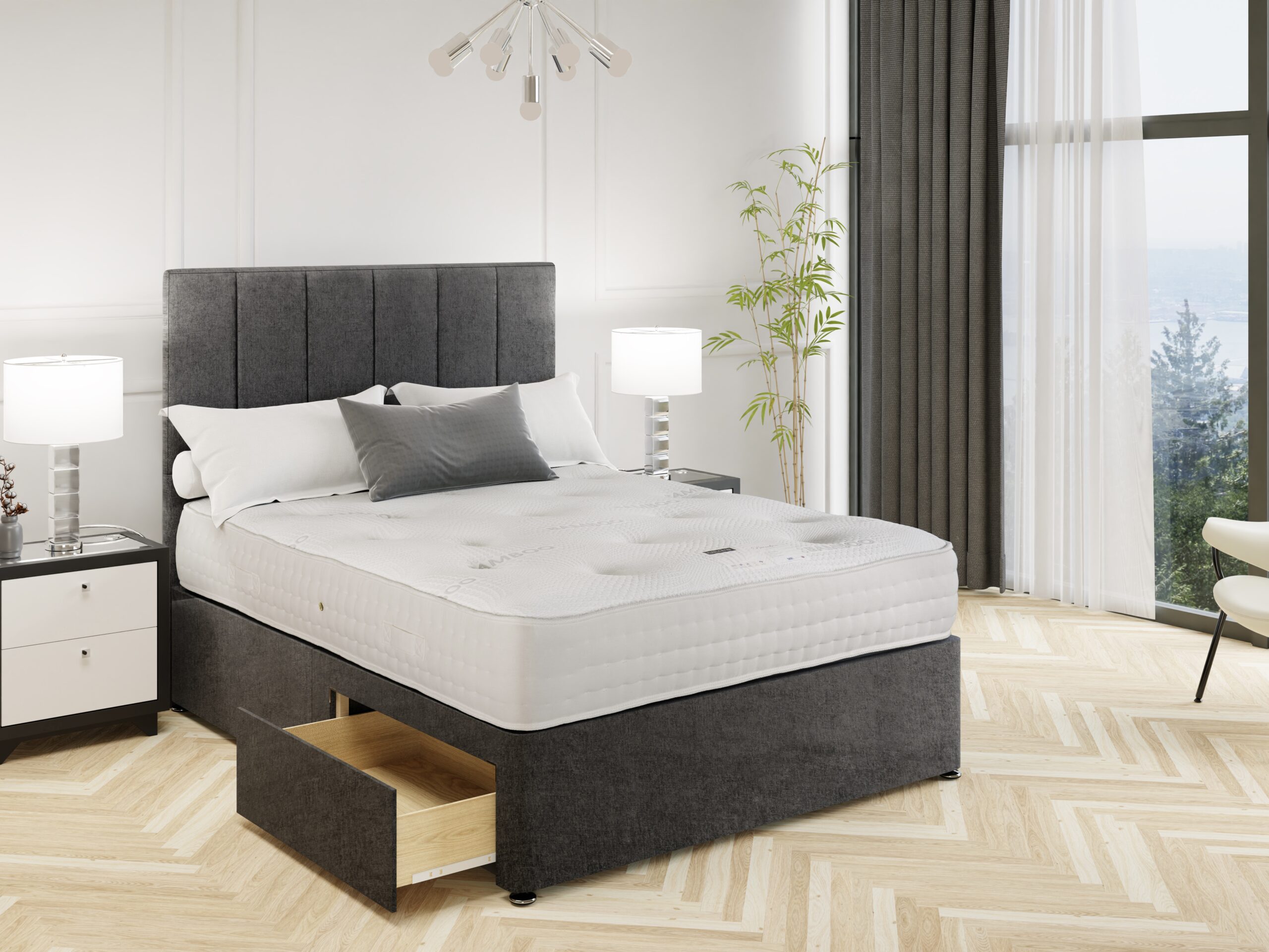 Kinetic mattress on a charcoal drawer divan with a panelled headboard