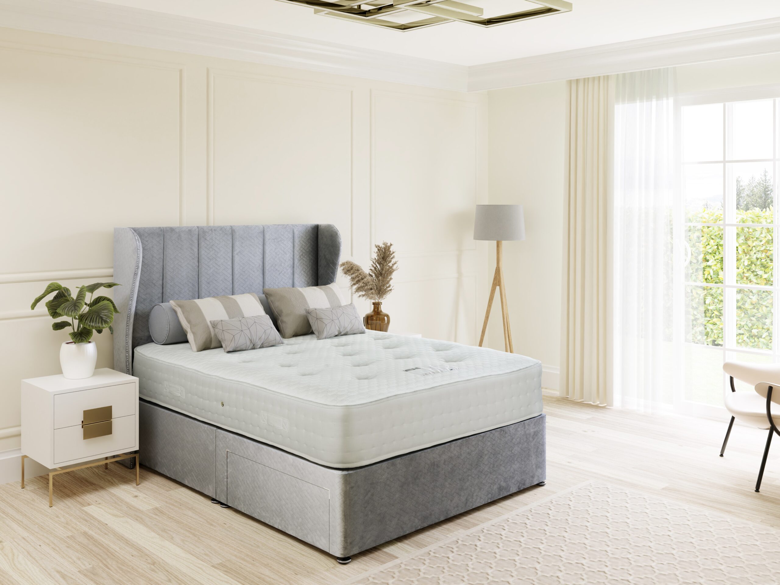 Mayfair 2000 mattress on a grey divan with a winged headboard