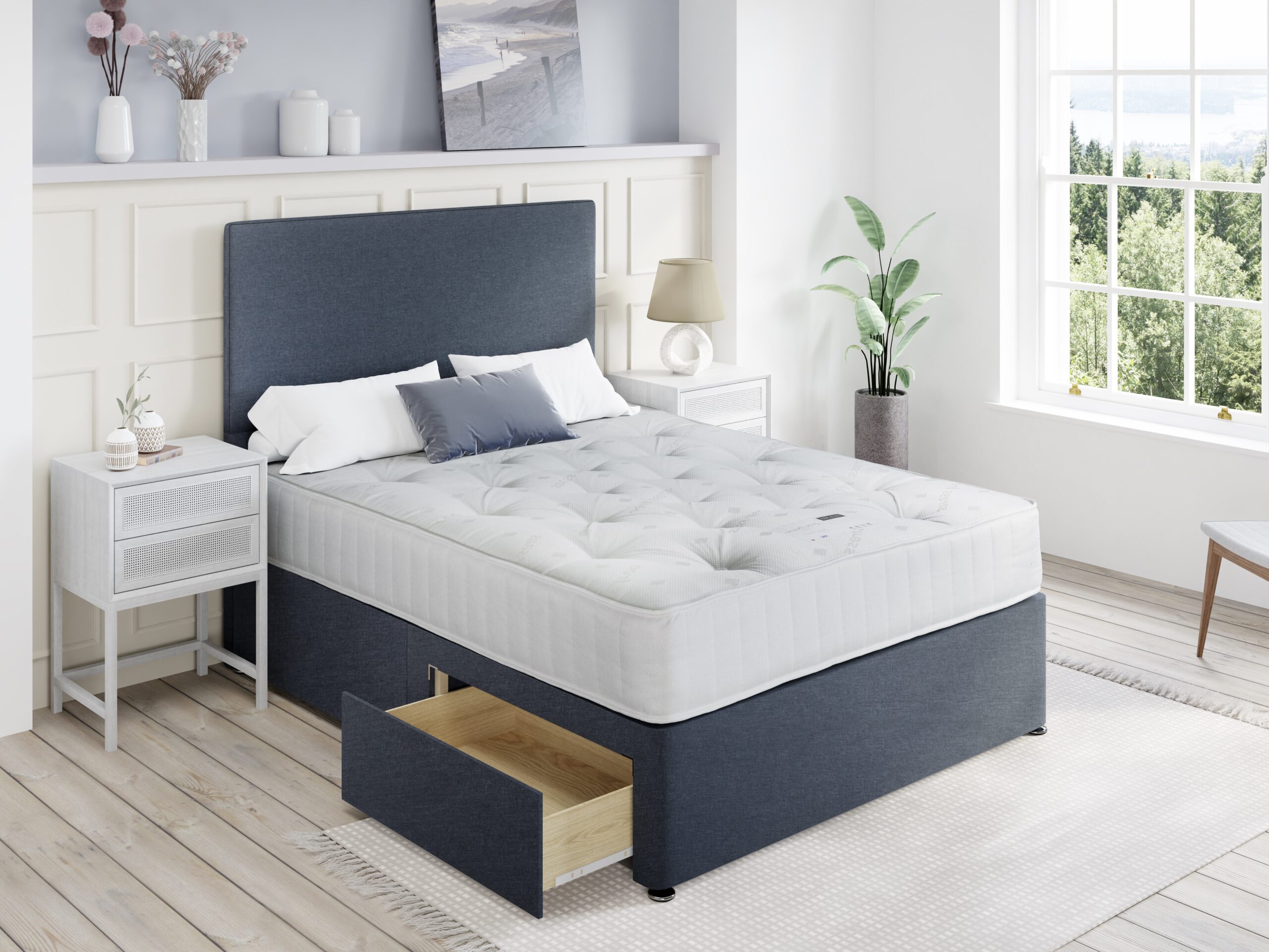 Ortho Deluxe mattress on a navy drawer divan