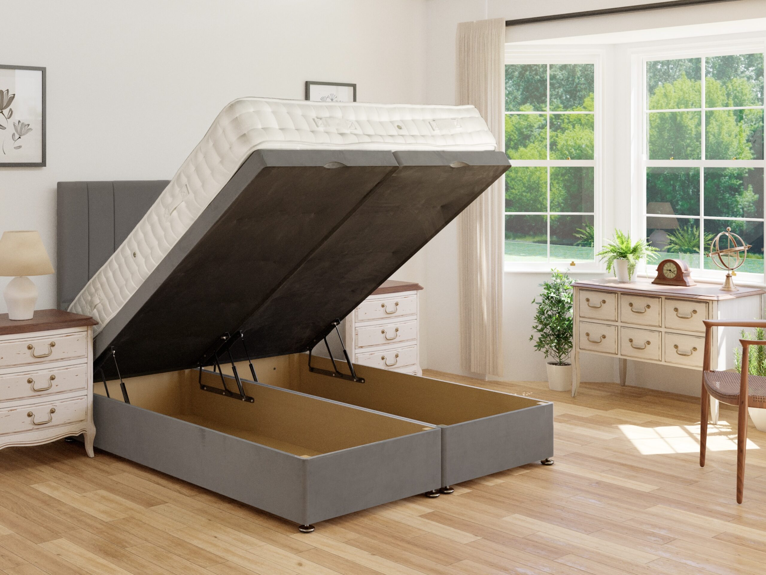 Grey ottoman storage base lifted to show the storage space