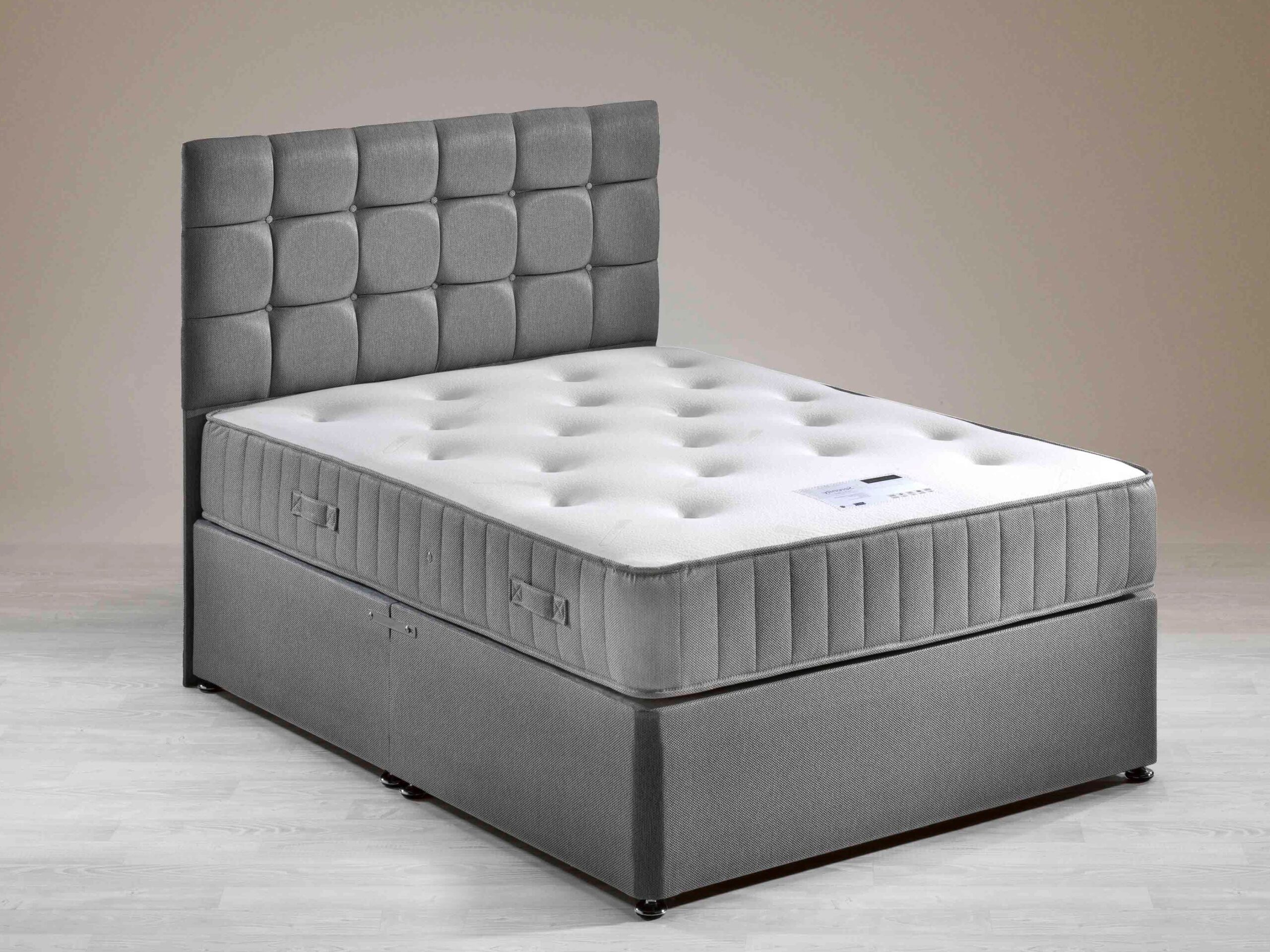 Serenity mattress on a grey divan with a cube panelled headboard