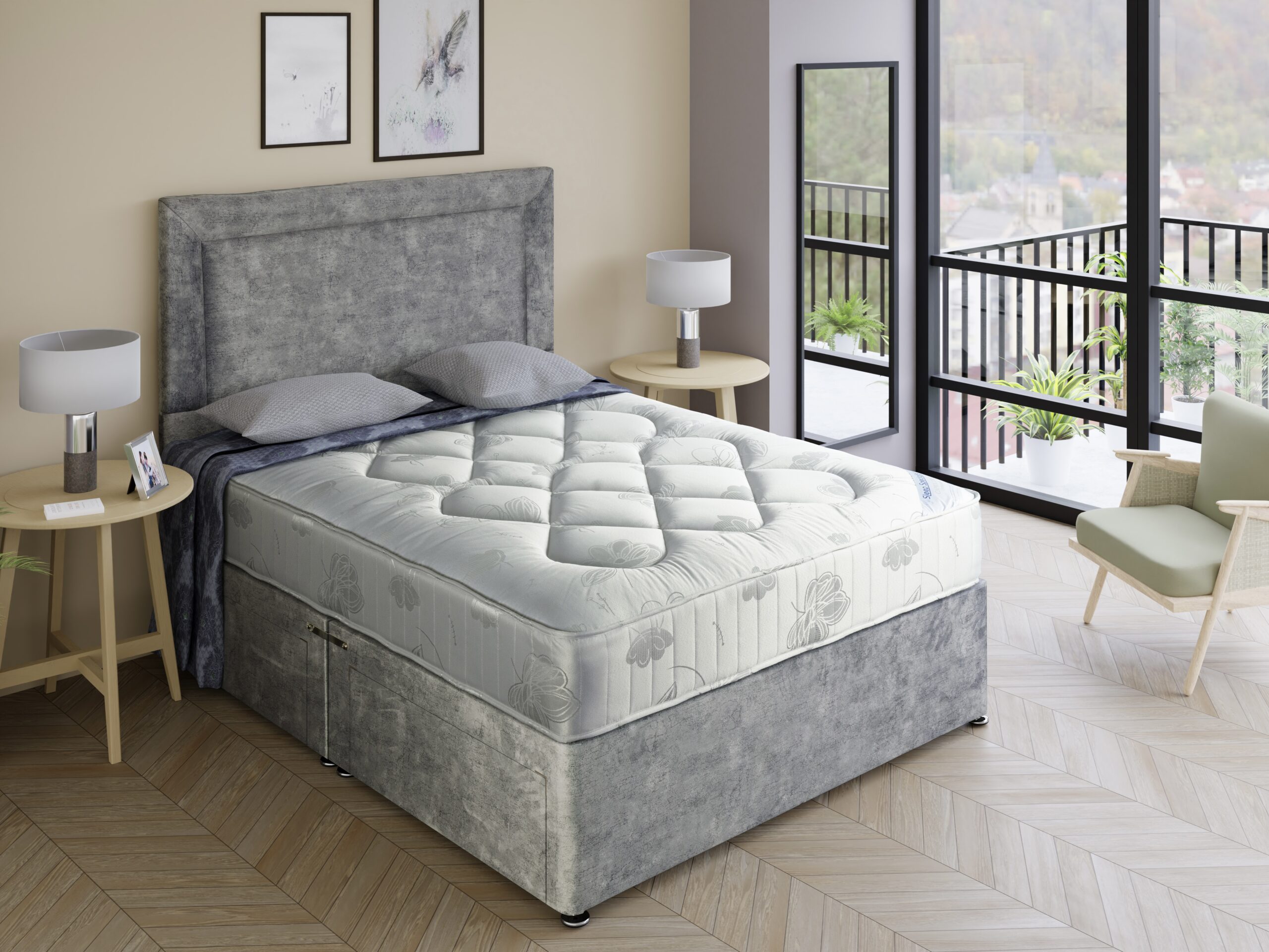 The Crown mattress on a silver crushed velvet divan